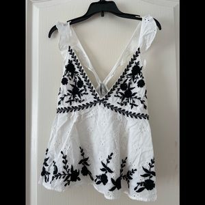 white Zara top with black embroidery